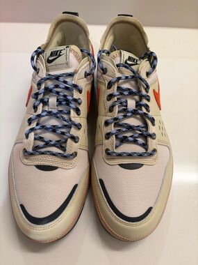 Nike Men’s Beige Sneakers with Orange Swoosh